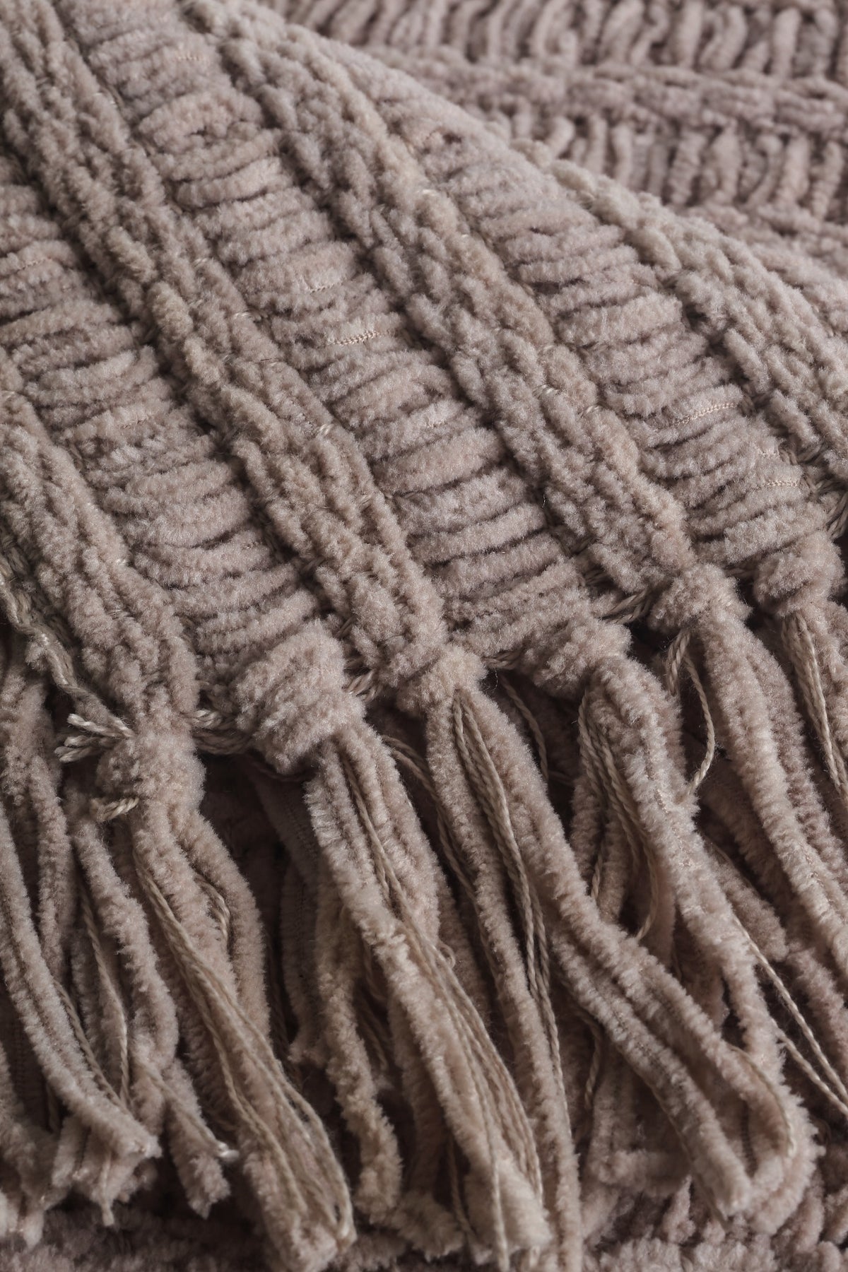 Amara Beige throw — ribbed texture and tassel detail