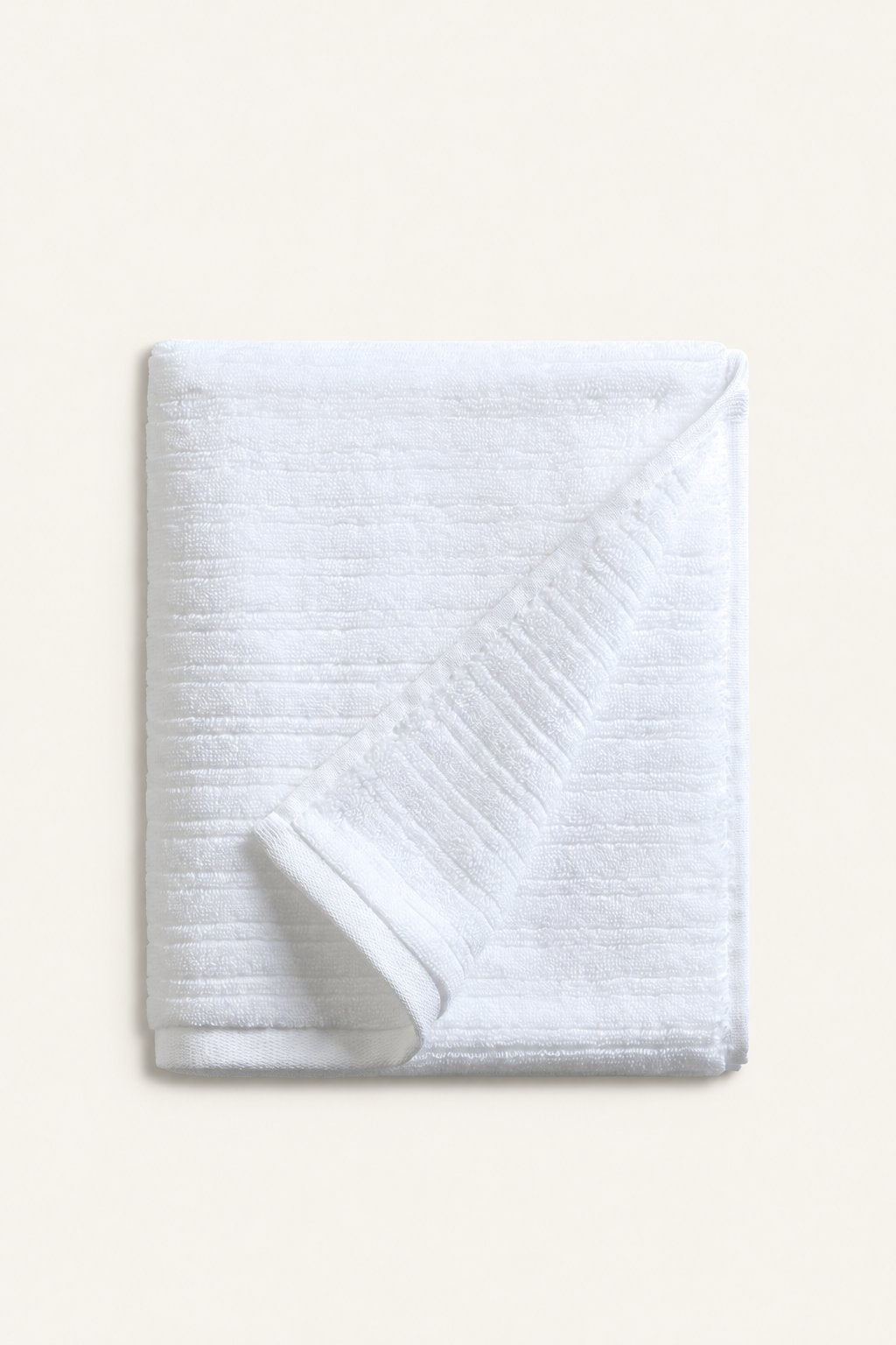 Pavia Home Aviola — Folded white towels