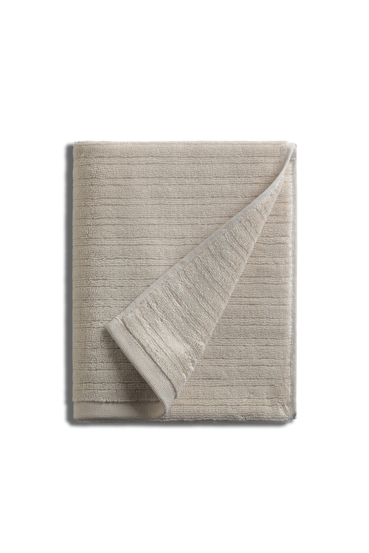 Pavia Home Aviola — Folded beige towels