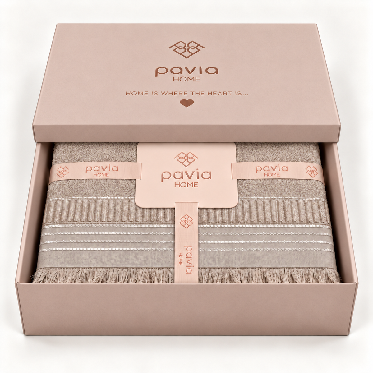 Boden beige towel set in a matte blush gift box with a partially closed lid, woven border and natural fringe