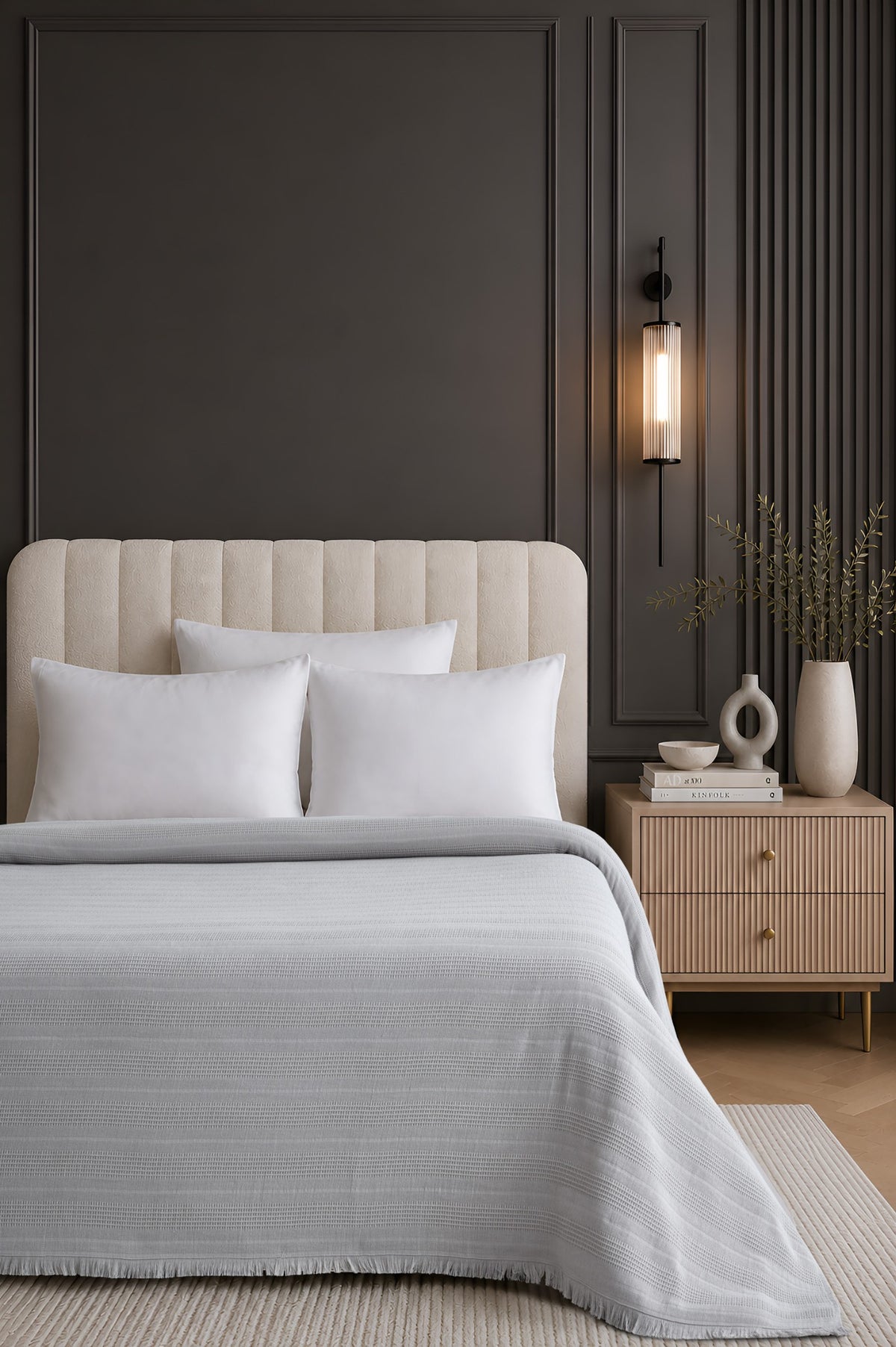 Erna Grey bedspread styled on a bed