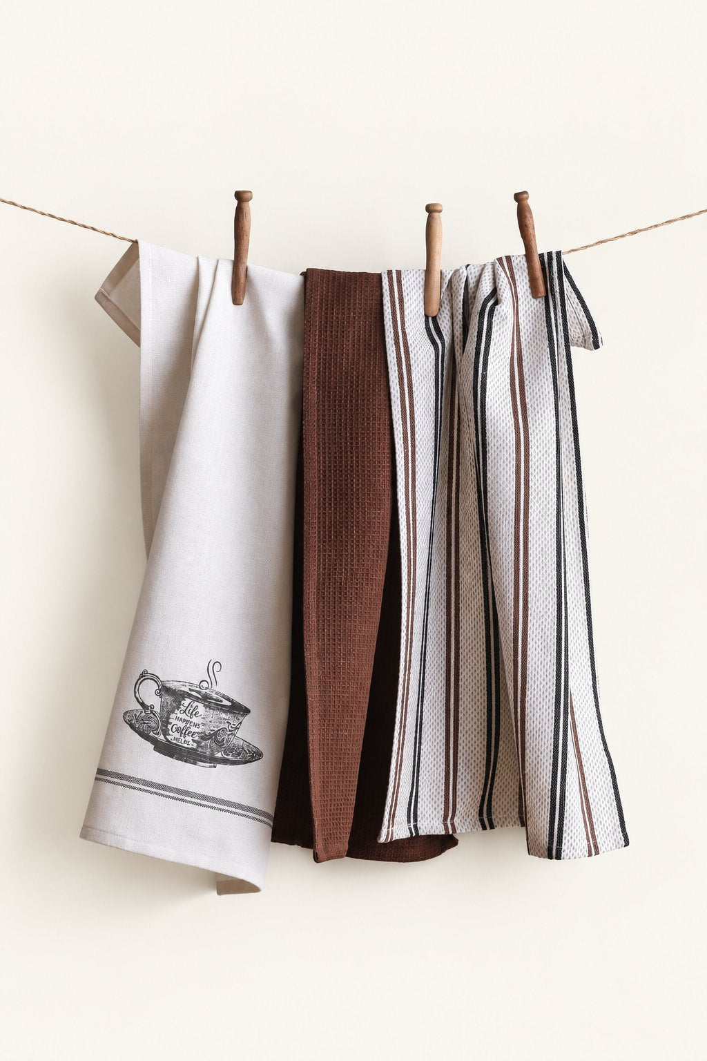 Pavia KT-04 kitchen towels — set of three displayed on a clothesline
