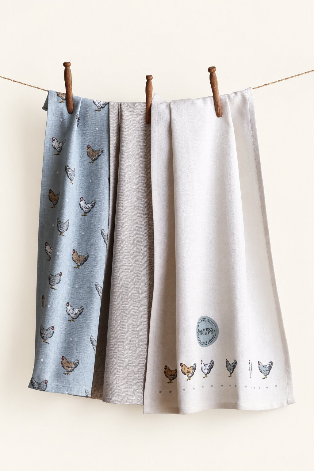 Pavia KT-09 kitchen towels — set of three displayed on a clothesline