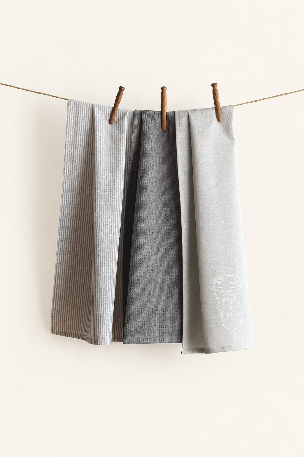 Pavia KT-37 kitchen towels — set of three displayed on a clothesline