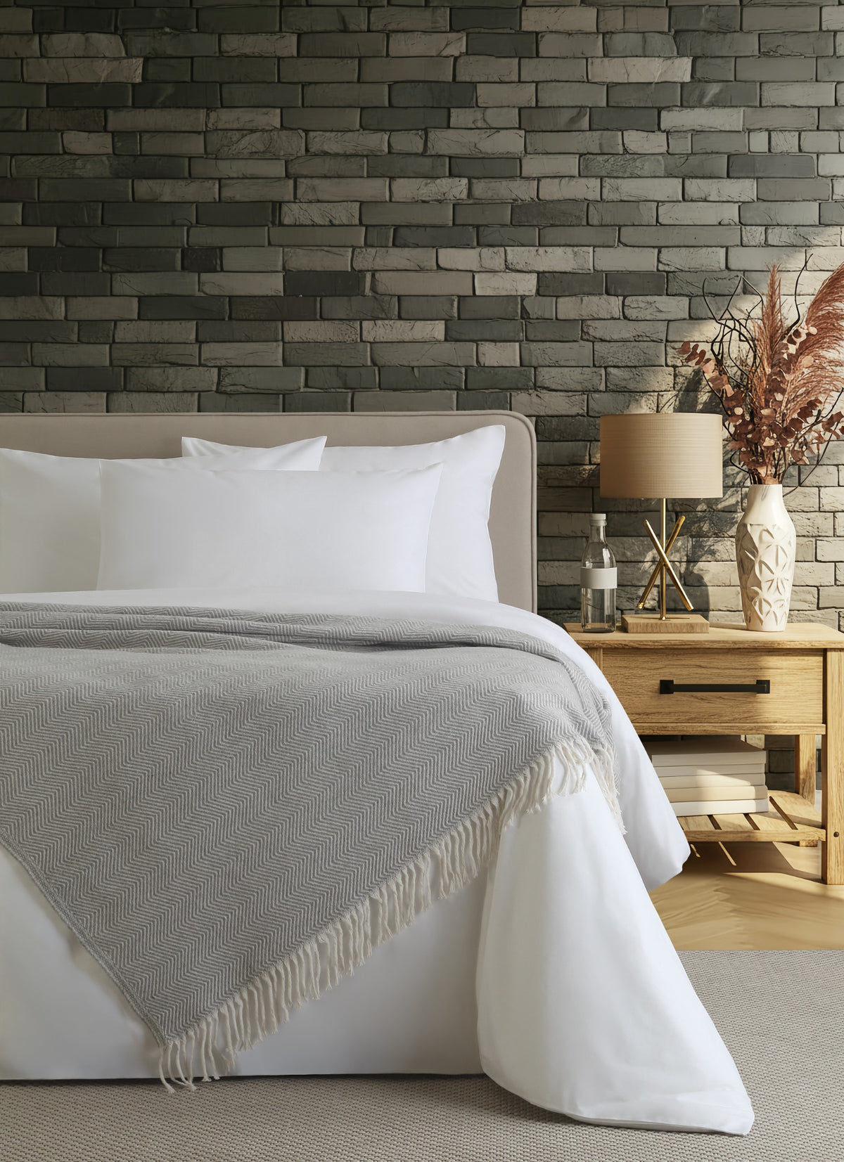 Nevada Grey blanket styled on a bed