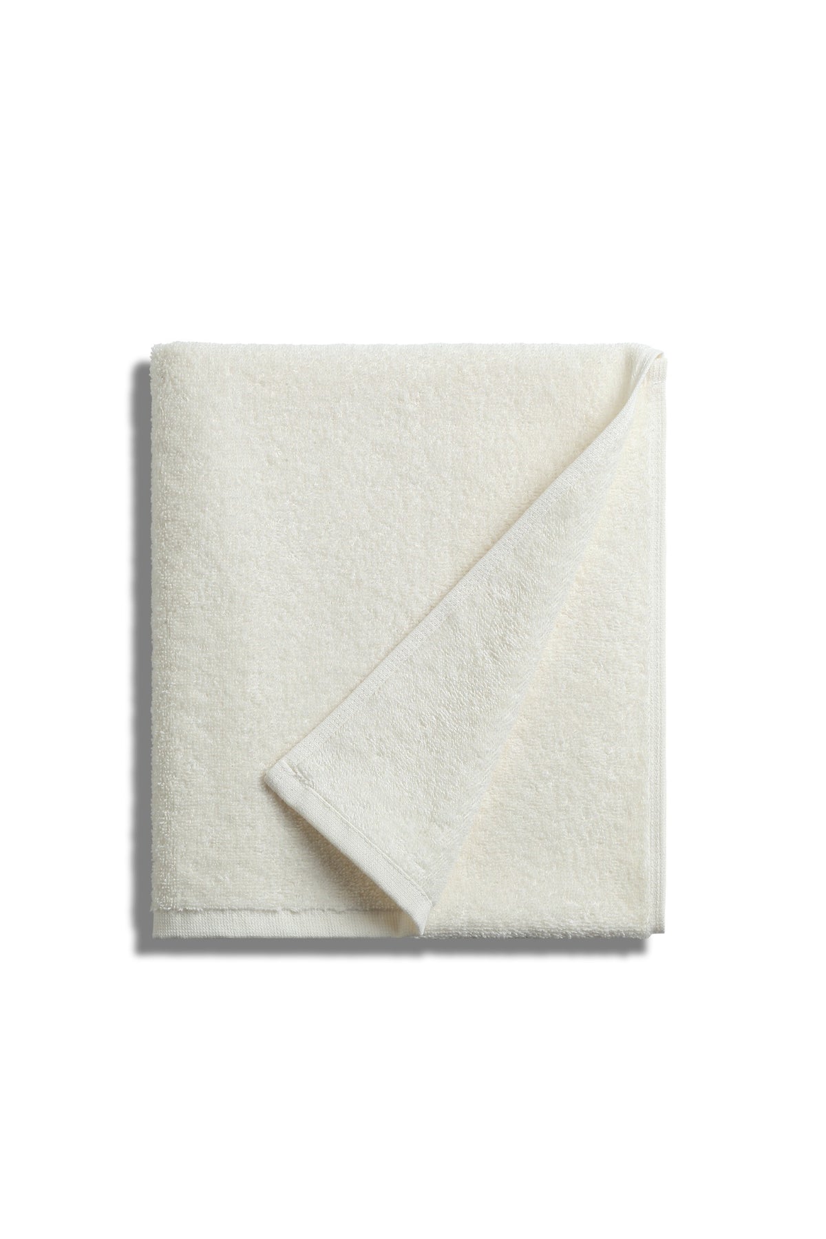 Folded Nicol towel in Ecru