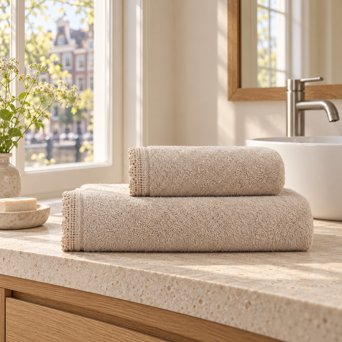 Pavia Home Carnia towel set — Beige, two folded towels in a warm Dutch bathroom