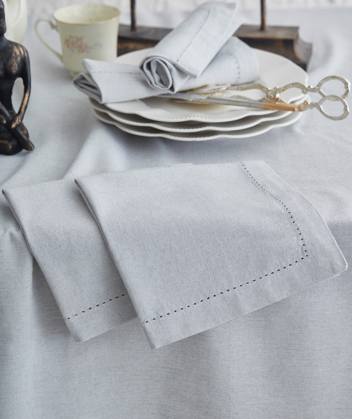 Detail of Jolly Light Grey tablecloth with matching hemstitched napkins