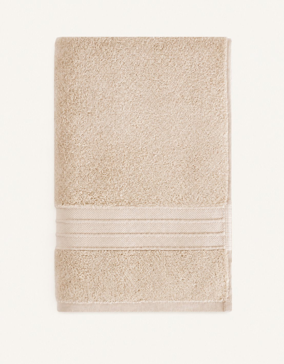 Jony — Handtuch in Beige, gefaltet