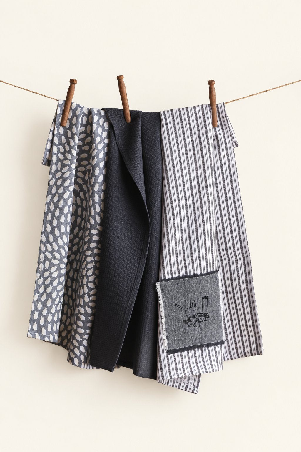 Pavia KT-17 kitchen towels — set of three displayed on a clothesline