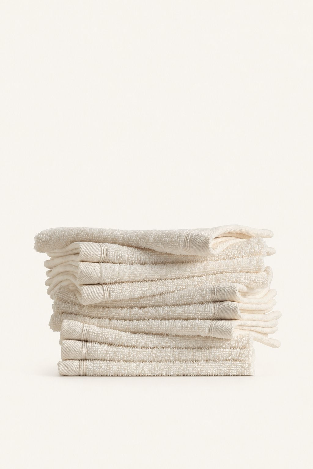 Lorens Ecru hand towels — folded stack