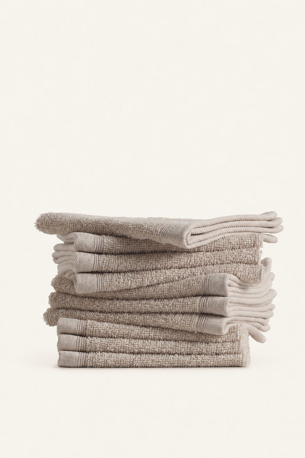 Lorens Beige hand towels — folded stack
