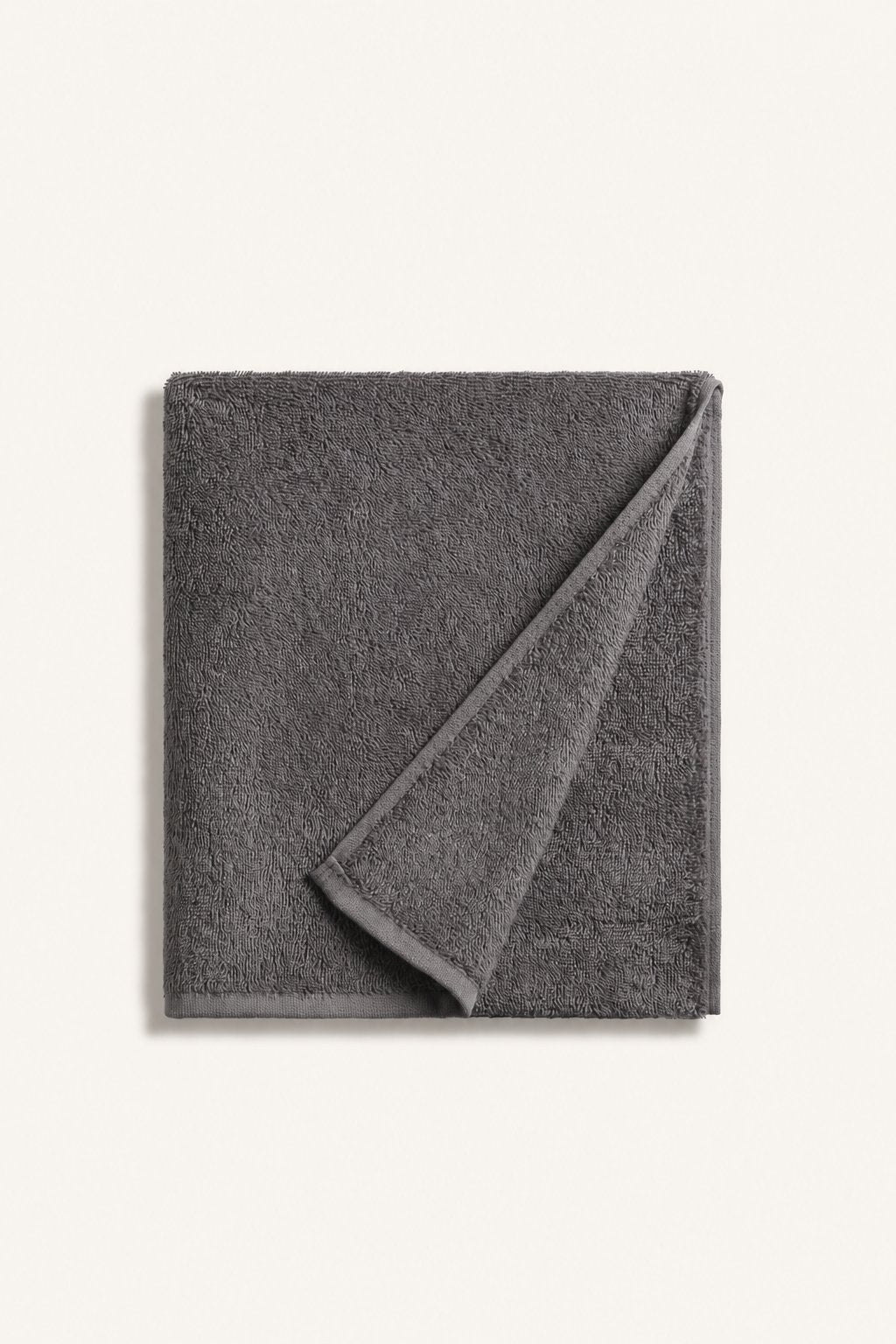Folded Nicol towel in Anthracite