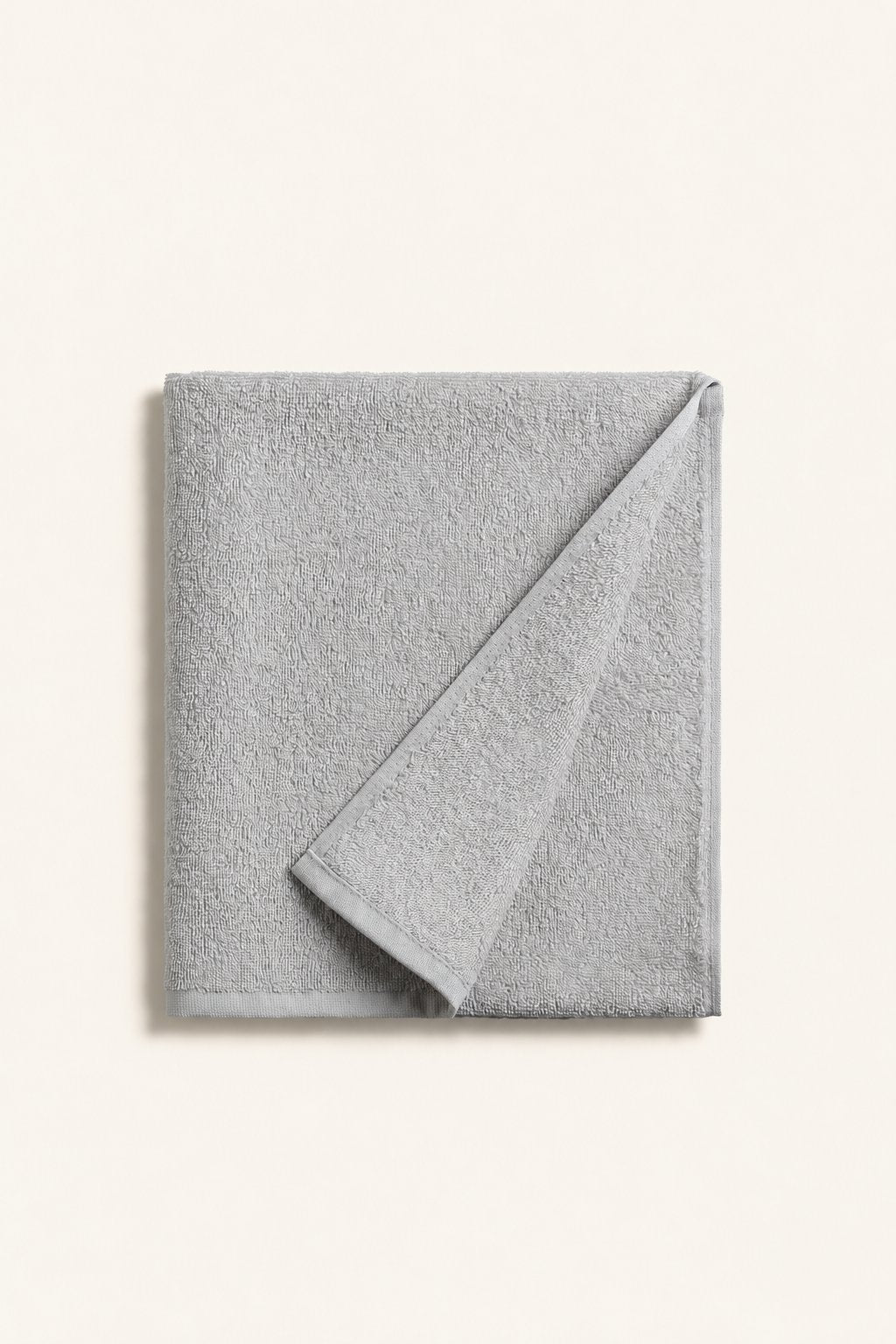 Folded Nicol towel in Grey