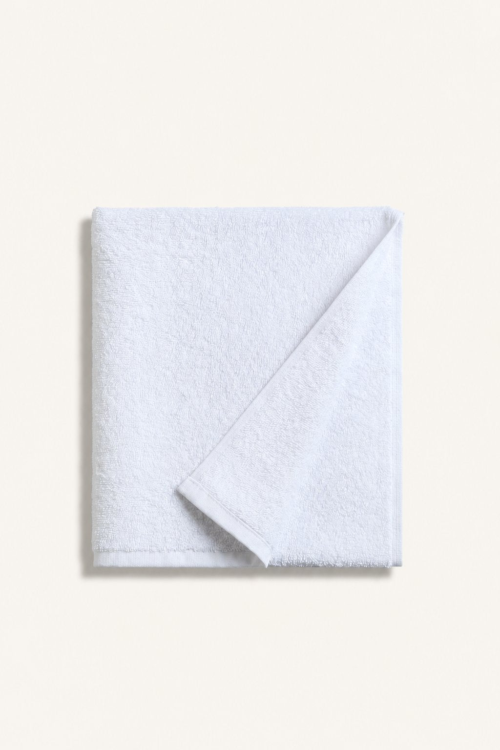 Folded Nicol towel in White
